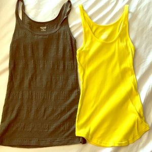 Two target tanks tops. One olive green. One yellow